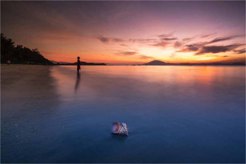 hình ảnh hoàng hôn buồn trên bãi biển