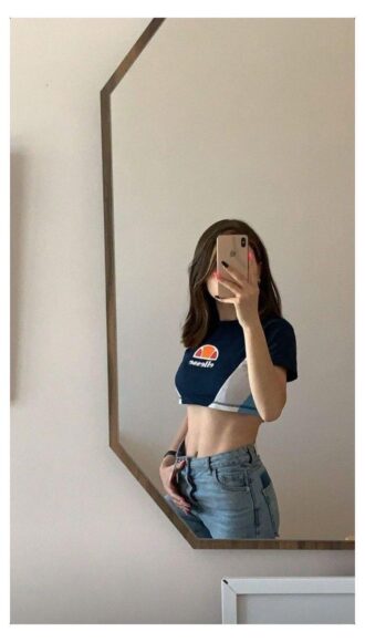 Ảnh eo thon che mặt áo quả cam